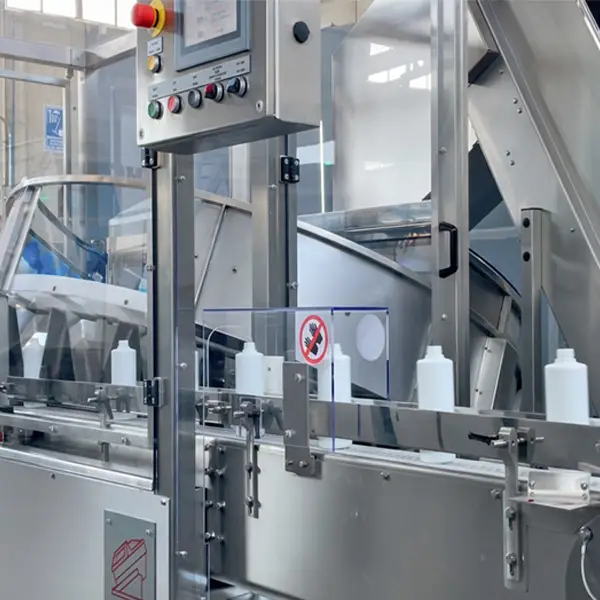 POSIMAT bottle unscrambler for automated bottle feeding to a pharmaceutical filling line