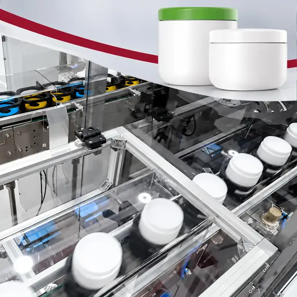 POSIMAT cosmetic jar handling system with jars in pucks, integrated into an automated packaging line.